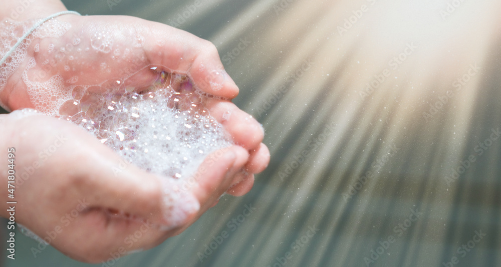Fototapeta premium hand hold bubbles in palm with light