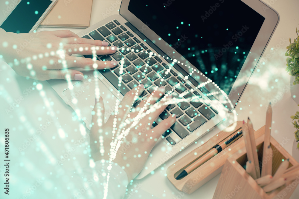 Double exposure of woman hands typing on computer and DNA hologram drawing. Medical education concept. Double exposure of woman hands typing on computer and DNA hologram drawing. Medical education concept.