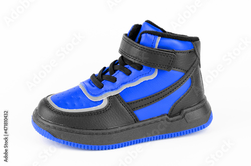 Children's black-blue sneakers on a white background. Children's sports shoes