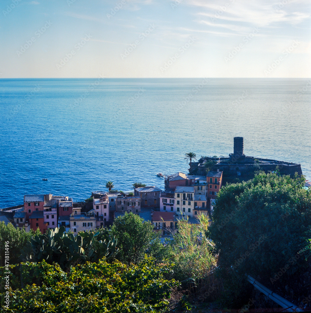 A peaceful view of the harbour of the village of Vernazza in the Cinque Terre in Italy, shot with analogue film technique