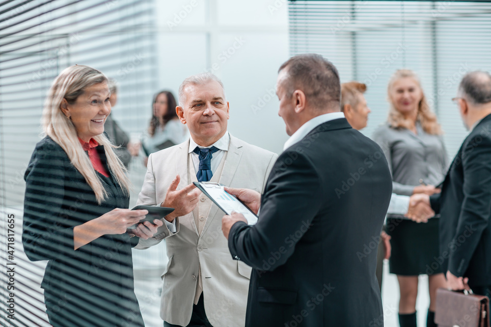 group of corporate employees discussing new ideas . group of corporate employees discussing new ideas .