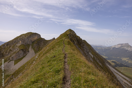 Amazing hiking day in the alps of Switzerland. Wonderful view over a beautiful lake called Brienzersee. What an amazing view. photo