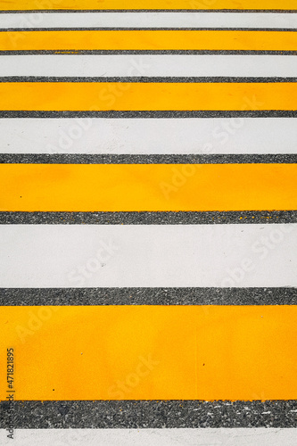 road marking White and yellow pedestrian crossing. Modern yellow and white zebra crossing