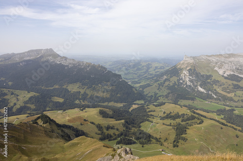 Amazing hiking day in the alps of Switzerland. Wonderful view over a beautiful lake called Brienzersee. What an amazing view. photo