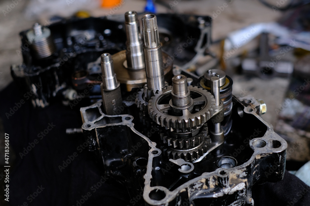 Assemble the motorcycle engine gear by a maintenance technician and check it. Assemble the motorcycle engine gear by a maintenance technician and check it.