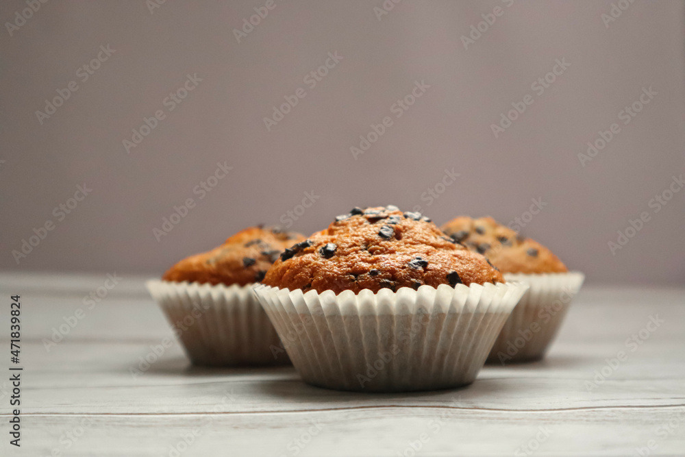 Chocolate chip muffin on white background Chocolate chip muffin on white background