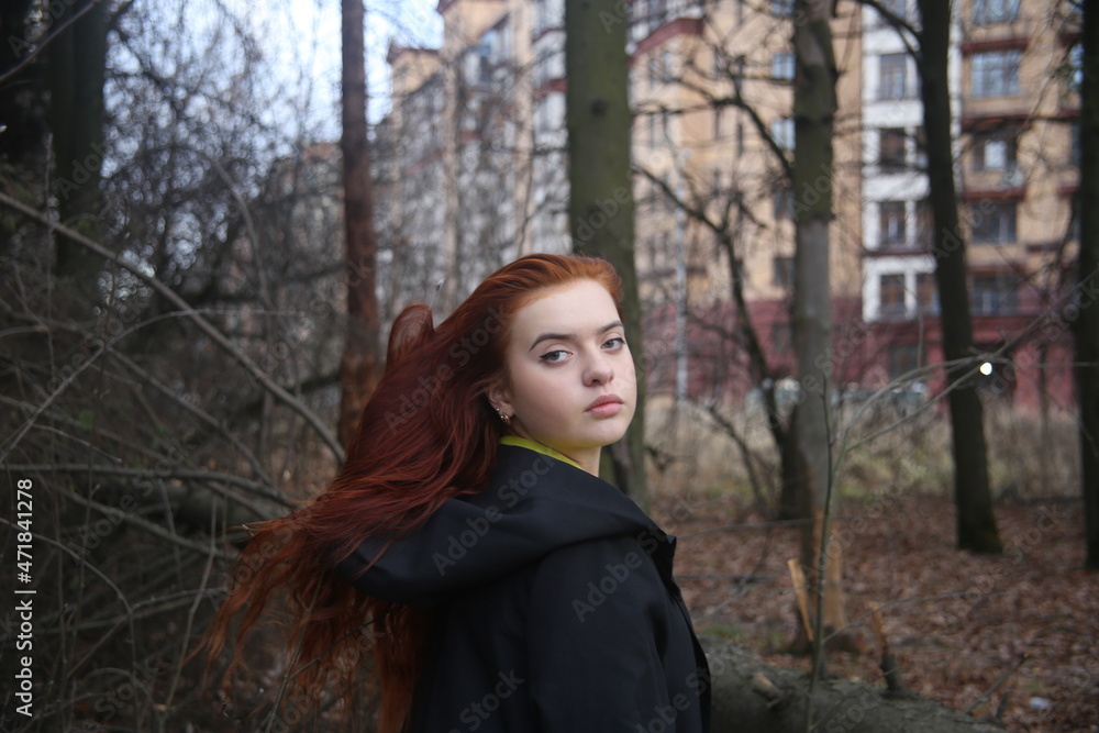 portrait of a young girl with red hair in a raincoat beauty female cute pretty face lady amazing woman black fashion model autumn outdoors smile nature forest portrait of a young girl with red hair in a raincoat beauty female cute pretty face lady amazing woman black fashion model autumn outdoors smile nature forest