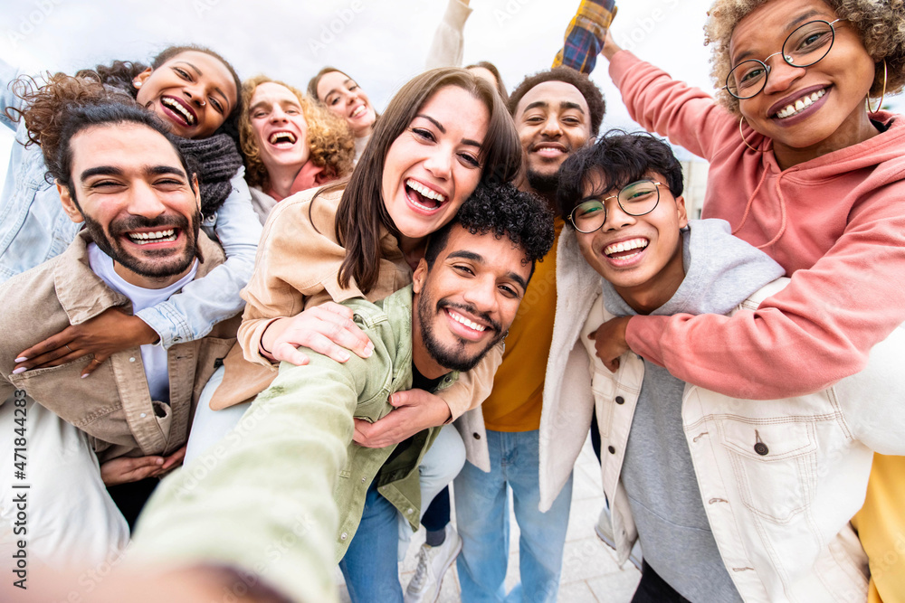 Multiracial friends group taking selfie portrait outside - Happy multi cultural people smiling at camera - Human resources, college students, friendship and community concept - obrazy, fototapety, plakaty 