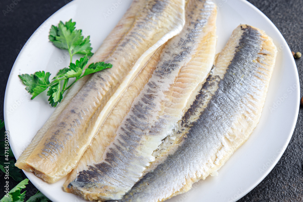 herring fish fillet fresh seafood meal snack on the table copy space food background herring fish fillet fresh seafood meal snack on the table copy space food background