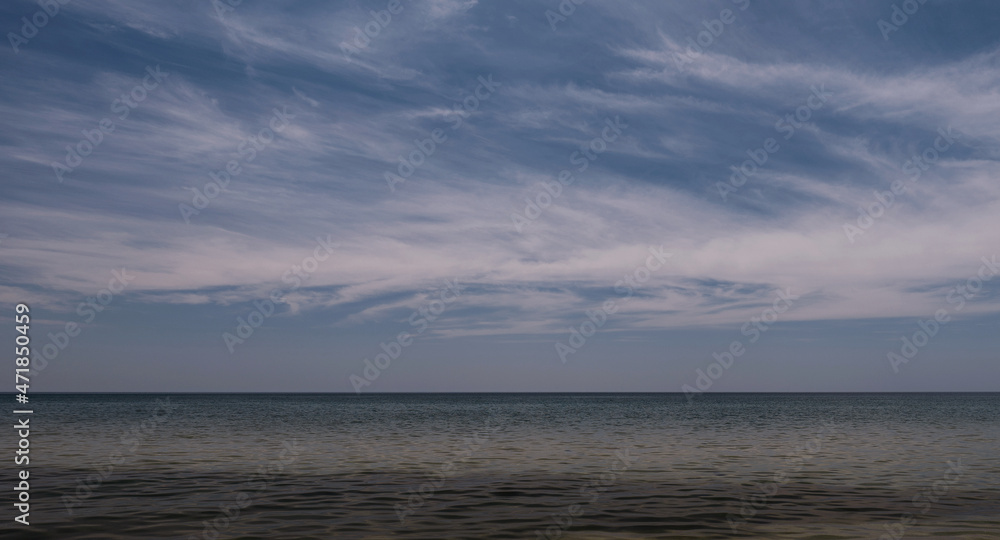 Beautiful smooth ocean landscape and sky with clouds. plenty of water. Relax