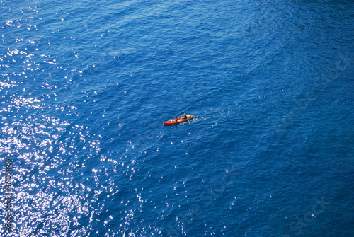 Riding tandem kayak. Double kayak on the sea.