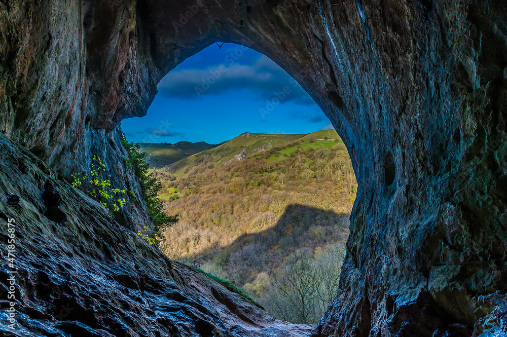 A view out from Thors Cave above the Manifiold valley next to the village of Wetton, UK on a sunny Autumn day