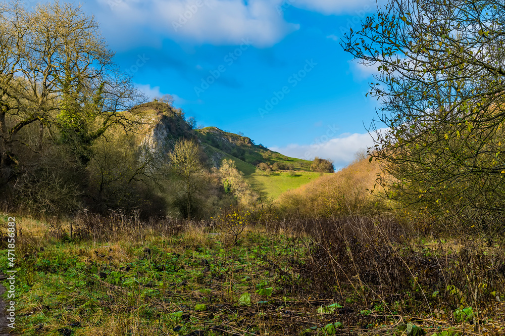 A view across rolling hills from the Manifiold valley next to the village of Wetton, UK on a sunny Autumn day A view across rolling hills from the Manifiold valley next to the village of Wetton, UK on a sunny Autumn day