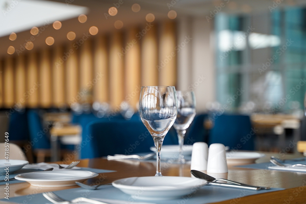 Empty Plates and Glasses in a Luxury Restaurant Empty Plates and Glasses in a Luxury Restaurant