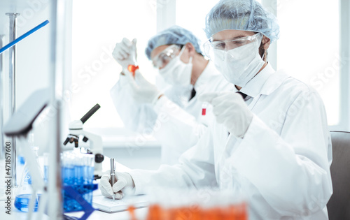 close up. group of laboratory technicians conduct testing in the laboratory .