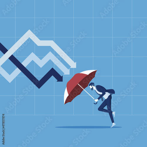 Protection stock market in economy crisis or market crash, businessman holding umbrella to protect from down arrow