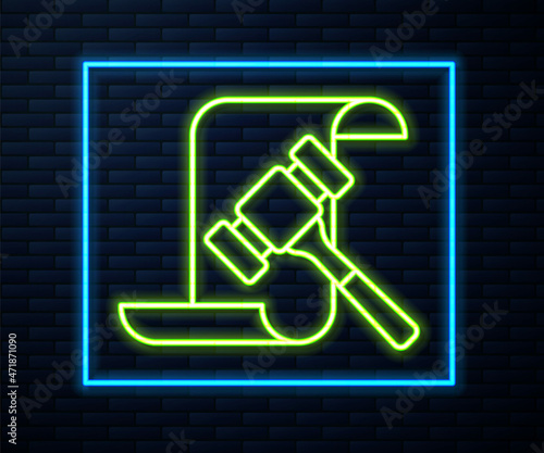 Glowing neon line Auction hammer icon isolated on brick wall background. Gavel - hammer of judge or auctioneer. Bidding process, deal done. Auction bidding. Vector