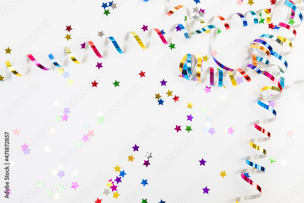 Colorful confetti on white background text place .