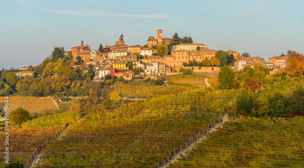 Beautiful hills and vineyards during fall season surrounding Neive village. In the Langhe region, Cuneo, Piedmont, Italy.