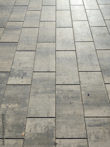 Background texture of artificial stone, paving stones, roads