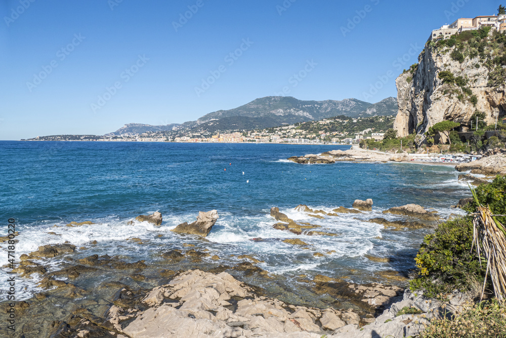 The beautiful Balzi Rossi beach in Ventimiglia with Menton in background