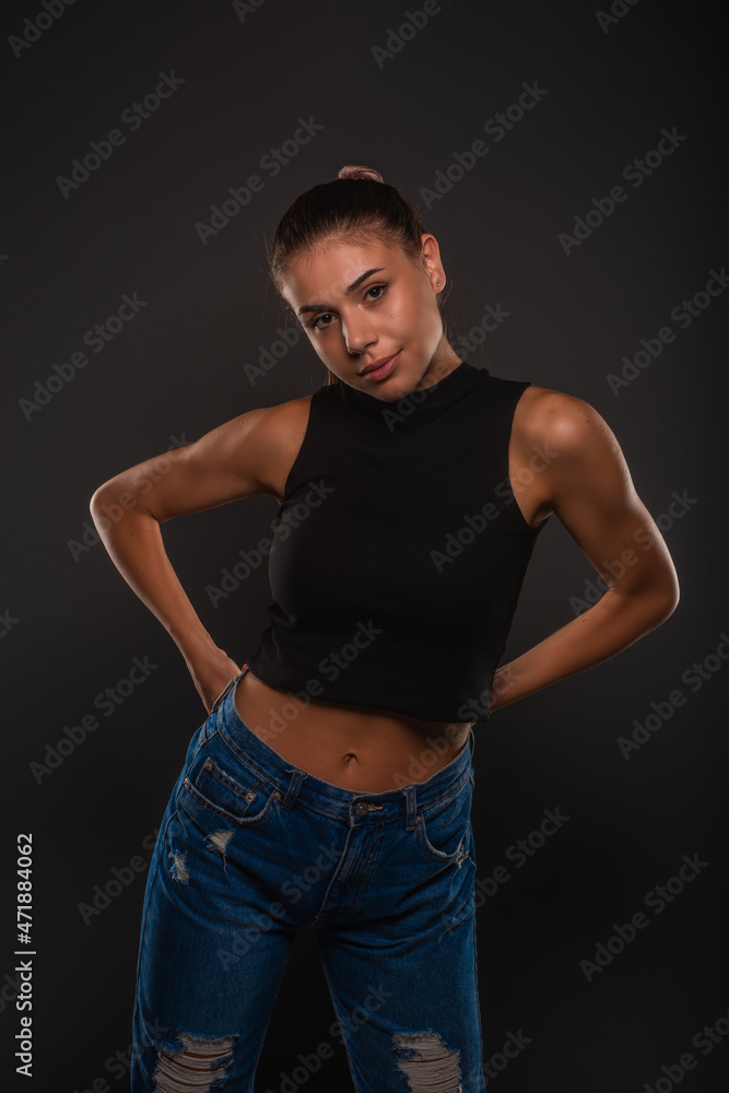 Posing with her hands behind Posing with her hands behind