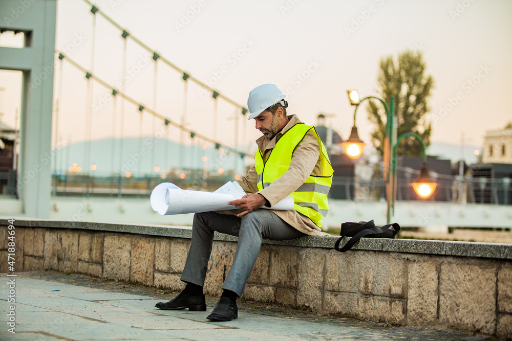 Sitting and looking at the plans alone by the river Sitting and looking at the plans alone by the river