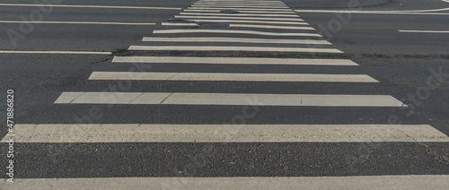 Pedestrian crossing on a wide highway. Background
