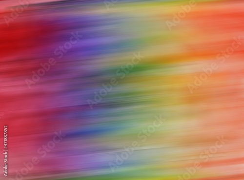 Multicolored defocused background. Rainbow, neon. Blurry lines and spots. Bright colors. Background for the cover of a laptop, notebook.