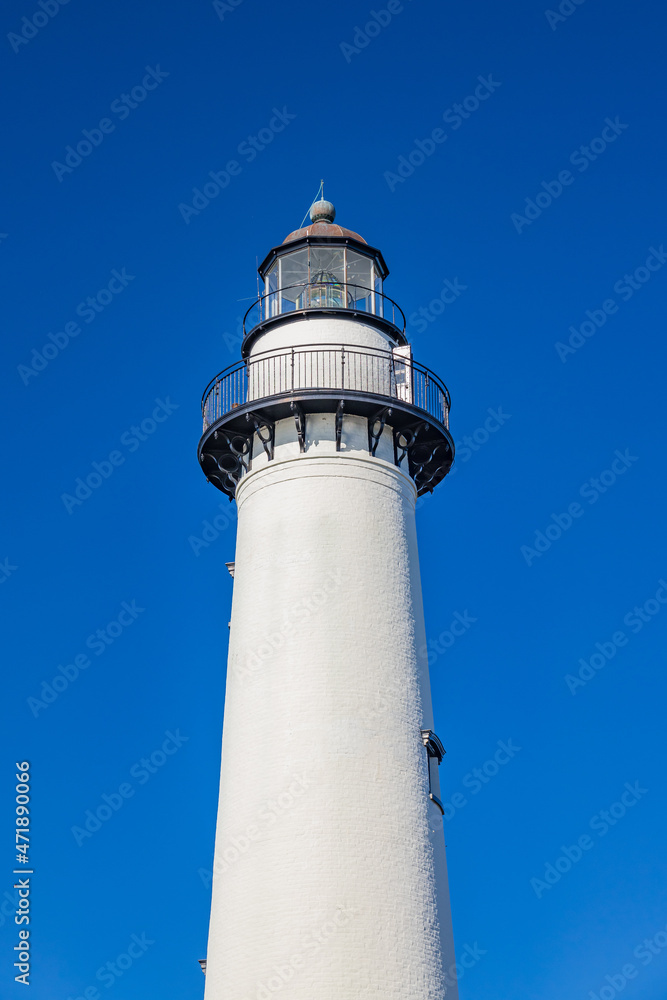 Lighthouse tower with blue sky background