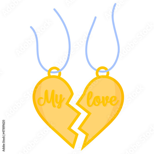 Halves of a pendant in the shape of a heart. Wedding and valentine day concept.