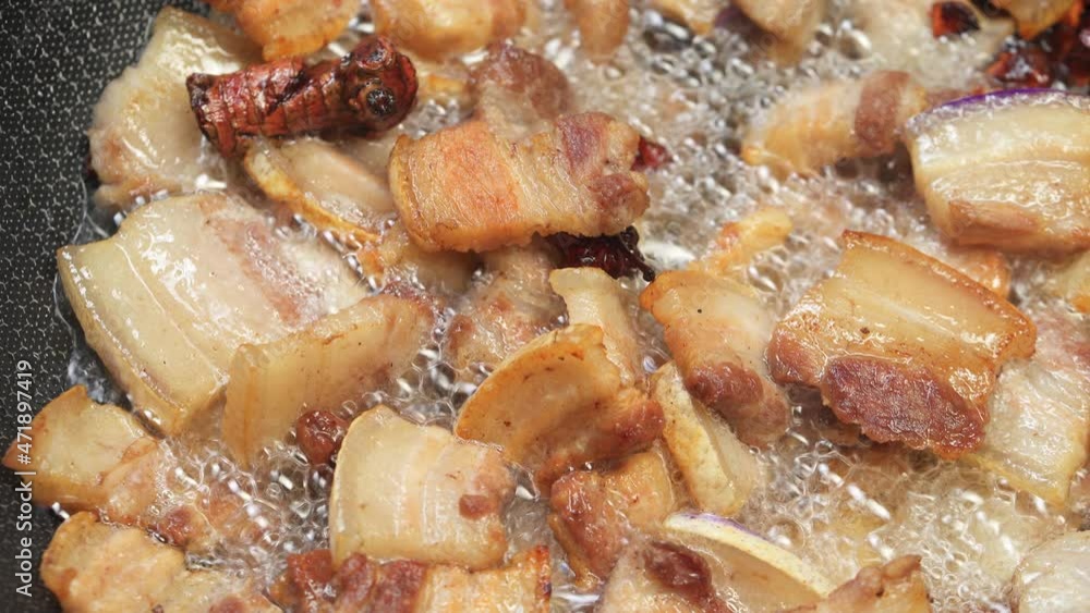 Deep-fried pork belly, a specialty snack of Northeast China Deep-fried pork belly, a specialty snack of Northeast China