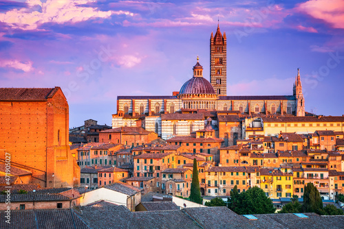 Siena, Tuscany, Italy - Dome sunset with blue sky
