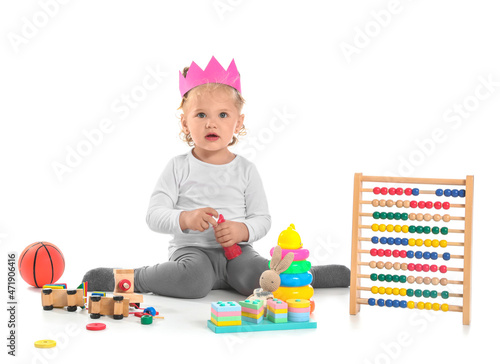 Cute baby girl playing with...