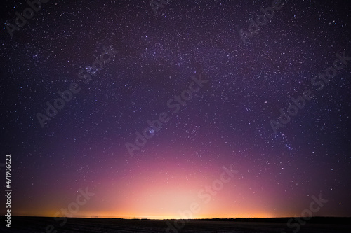 Real Night Sky Stars Background With Natural Colourful Sky Gradient. Sunset, Sunrise Light And Starry Sky. Yellow And Magenta Colors