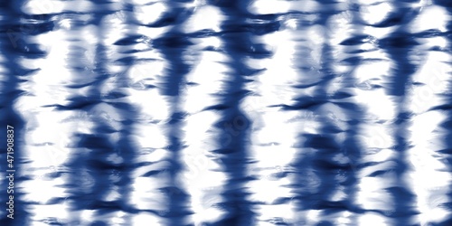 Fotografie Seamless indigo tie dye 1970s funky hippie repeat pattern swatch motif for surface design and print