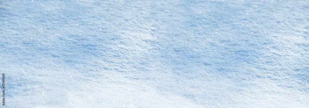 Beautiful abstract snow natural background. blue-white snowy texture surface. winter season. banner. copy space