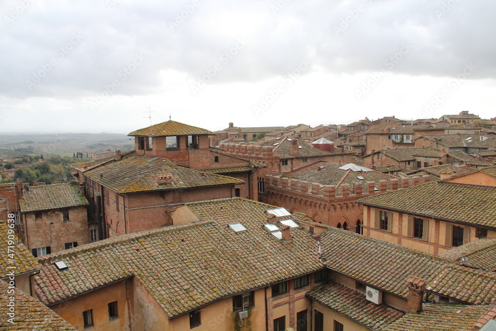 Panorama dal Facciatone, panoramic view of Siena, Italy of  church facade, and centuries-old towers & piazzas.