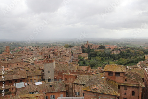 Panorama dal Facciatone, panoramic view of Siena, Italy of church facade, and centuries-old towers & piazzas.