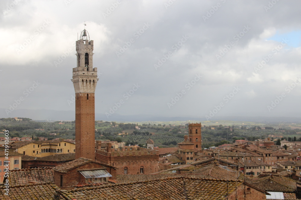 Fototapeta premium Panorama dal Facciatone, panoramic view of Siena, Italy of church facade, and centuries-old towers & piazzas.