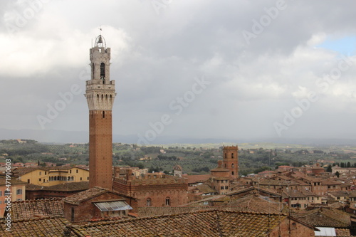 Panorama dal Facciatone, panoramic view of Siena, Italy of  church facade, and centuries-old towers & piazzas.