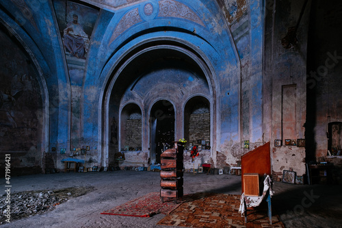 Interior of old abandoned Orthodox church of Smolensk icon of the mother of god with remnants of fresco photo