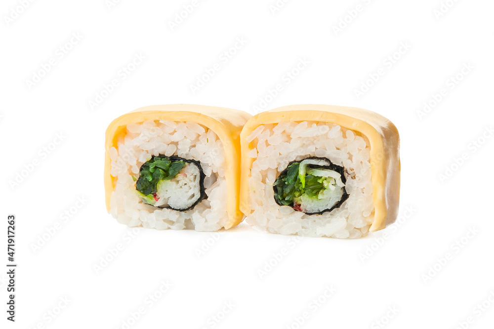Two pieces of Japanese sushi roll with egg omelet on top seaweed and crab meat stick inside roll. Side view of Asian inside out roll isolated on white background. Copy space menu image
