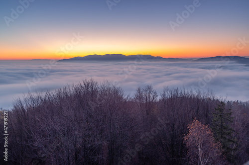 Fototapeta Naklejka Na Ścianę i Meble -  Misty autumn mountains landscape in the morning, Poland, Beskidy mountains seen from Koziarz peak.
