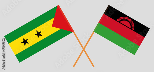 Crossed flags of Sao Tome and Principe and Malawi. Official colors. Correct proportion