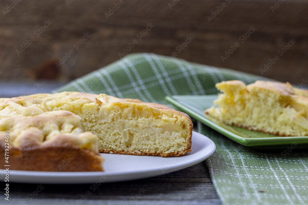 Italian Apple Pie, though it looks like a cake, sliced and plated Italian Apple Pie, though it looks like a cake, sliced and plated