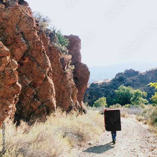 Climber Hiking with Bouldering Pad in California