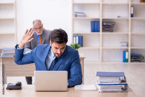 Two colleagues working in the office