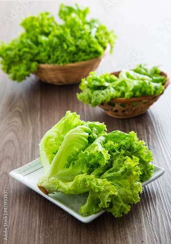 Fresh lettuce vegetable on a wooden table