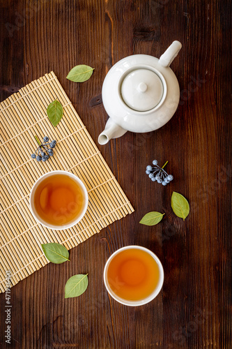 Obraz na płótnie Asian tea set with white teapot and two cups, top view w salonie